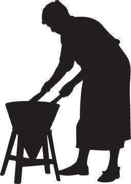 Silhouette of a woman stirring a mixing bowl on a stand