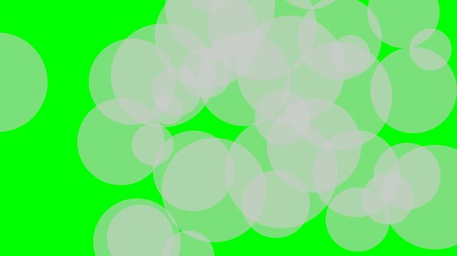 Abstract background featuring numerous translucent white circles overlapping on a bright green screen, perfect for motion graphics and animation projects and creative video effects