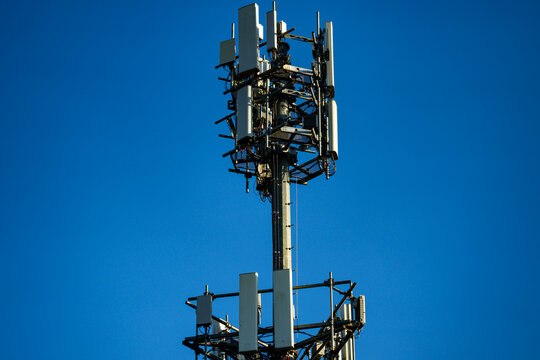 Cellular telecommunications tower. Telecom mobile network. Wireless communication network. Mobile infrastructure. antenna array. Antenna panel. Radio telecom antenna. Cell tower.