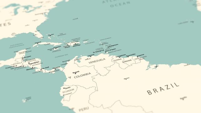 Venezuela on a detailed political map of South America and the Caribbean region. Smooth camera movement focuses on the country, its capital Caracas, northern coastline, surrounding borders and nearby 