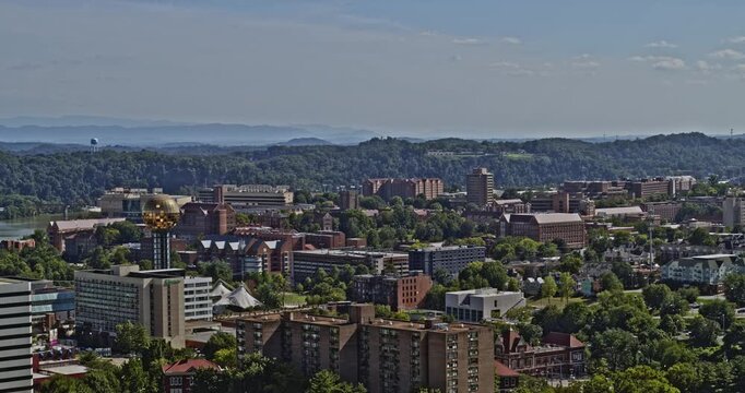 Knoxville Tennessee Aerial v8 panoramic circular pan low level shot capturing the neighborhoods against mountainous and blue sky background - Shot with Inspire 2, X7 camera - August 2020