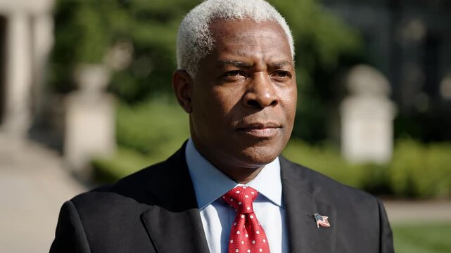 Confident African American Senior Executive in Formal Suit with US Flag Pin, Outdoor Portrait