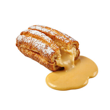 Churro manjar pastry sliced lengthwise with Chilean dulce de leche filling flowing out on a transparent background