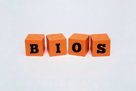 A coloured blocks with the text BIOS. BIOS acronym for "BASIC INPUT, OUTPUT SYSTEM". Computer hardware settings, firmware and technology concepts