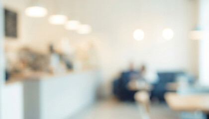 Fototapeta premium A softly focused interior of a modern cafe showcasing blurred figures enjoying their time in a casual setting with stylish furnishings.