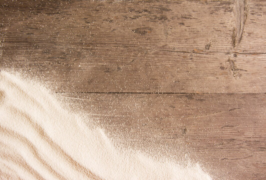 White sand and on planked wood. Summer background with copy space for text. Top view