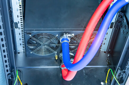 server racks with a liquid cooled supercomputer system with tube  