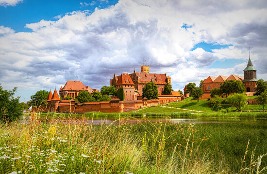 Malbork Castle and the Nogat river in autumn	