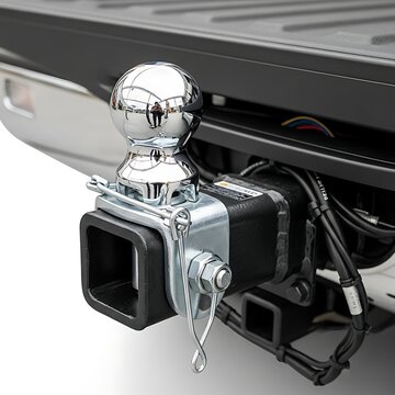 Shiny Chrome Trailer Hitch Ball Mounted on Vehicle Tow Receiver