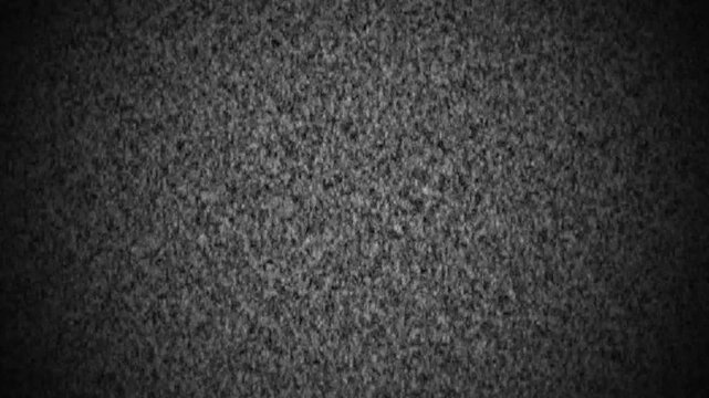 Minimalist dark background texture loops subtle grainy monochromatic camera noise specs. Corporate video title templates require a minimalist dark background texture overlay.
