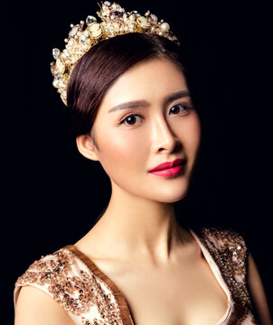 Asian sexy young woman on black background