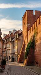 Fototapeta premium Historic Brick City Wall Overlooking Quiet Cobblestone Street in Old European Town