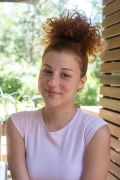 Young woman redhead smiling portrait closeup