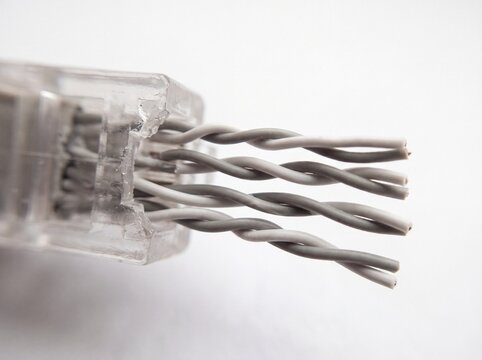 Close up of silver metallic wire brush bristles on white background