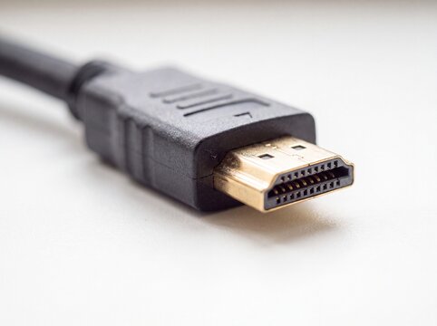 Close up of modern USB cable connector on white background with soft light