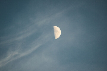 Half Moon in Clear Sky with Soft Clouds © Dawid