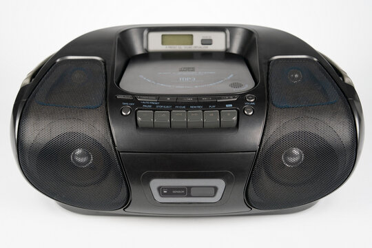 Black portable CD radio cassette player with MP3 playback isolated on white