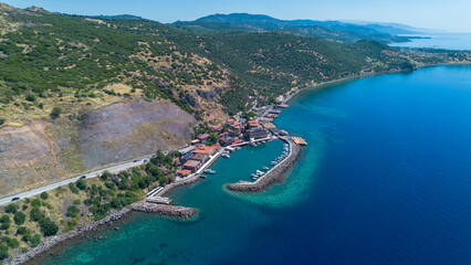 Obraz premium Aerial Drone View of Ancient Assos Harbor and Aegean Sea Coastline Canakkale Turkey