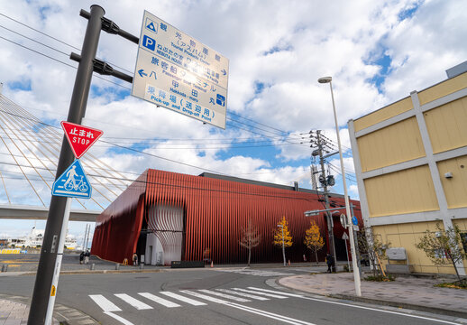 Nebuta Museum Wa Rasse, Aomori, Japan - Nov. 15, 2023: Red slatted facade of Nebuta Museum.