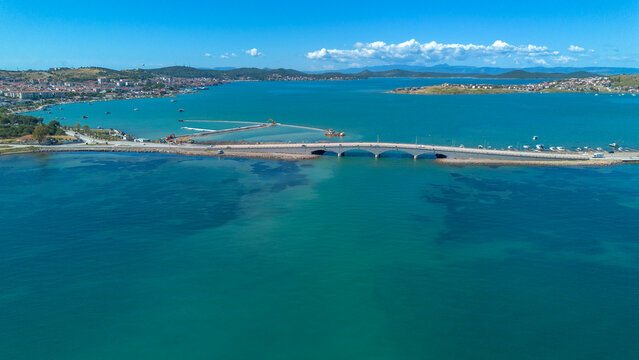 Aerial Drone View of Cunda Island Bridge and Turquoise Aegean Sea Balikesir Turkey