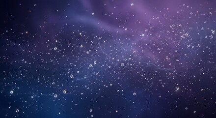 Fototapeta premium Crystal droplets floating on deep purple blue galaxy background with soft focus and sparkling particle effect