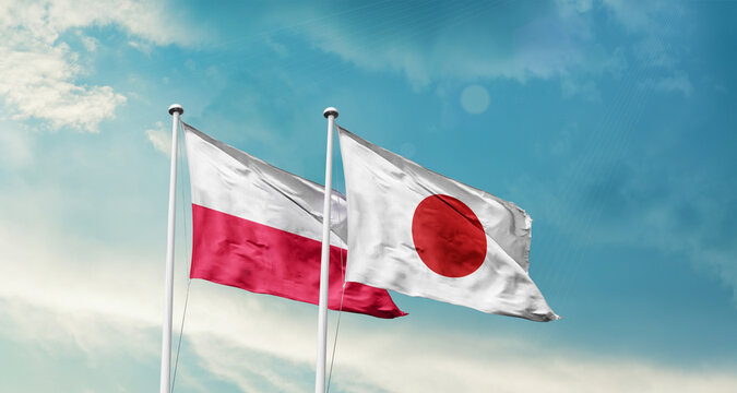 Poland and Japan friendship flags are waving in the sky. Two country flag for agreement or deal. Poland Japan national flag for commitment.
