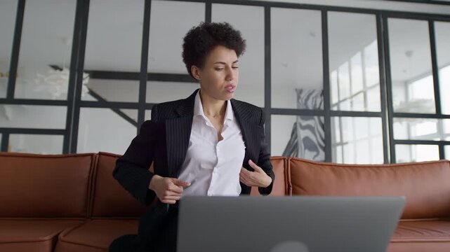 Businesswoman suffering back pain from bad posture