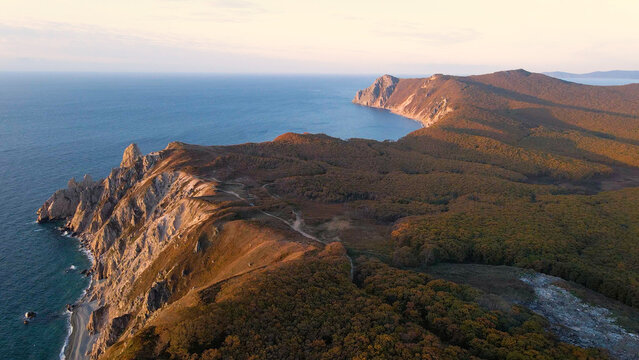 Russian Far East scenic view in Primorsky krai of Russia, with Tasovaya bay landscape on the rocky shoreline.
