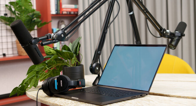 Laptop mockup blank screen radio interview microphone podcast studio