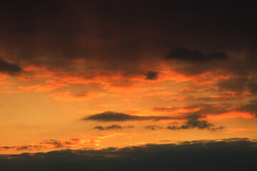 Fototapeta premium Dramatic orange sunset clouds over Kozlovice in Beskydy Mountains