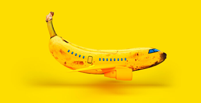 Banana representing airplane against yellow background