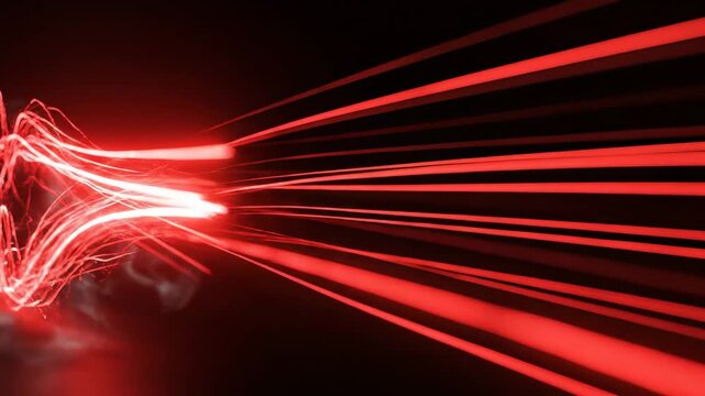 Red laser light beams streaking across a dark background, creating dynamic patterns and visual effects, showcasing the continuous flow of light in motion