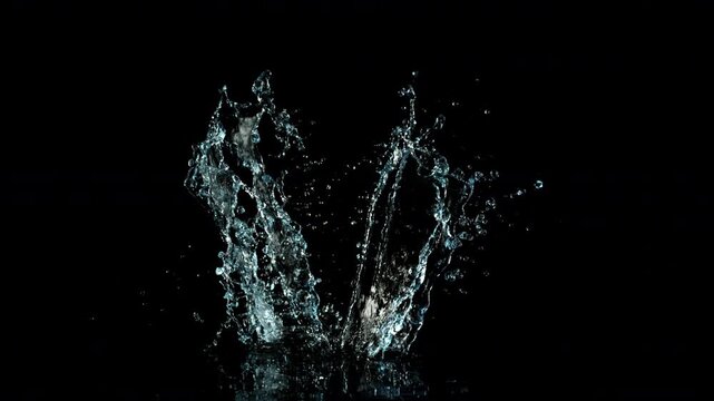 Super Slow Motion Shot of Water Splash Isolated on Black Background at 1000fps.