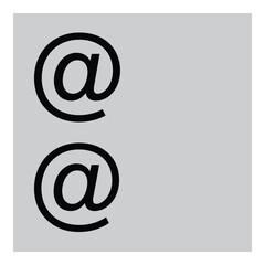 Fototapeta premium Hand-drawn stylized at symbol on grid background