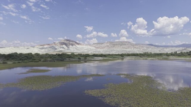 Drone Footage of Nallihan Bird Sanctuary and Rainbow Hills in Ankara Turkey Showing Wetlands and Colorful Geological Landscape