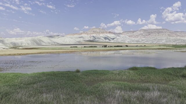 Drone Footage of Nallihan Bird Sanctuary and Rainbow Hills in Ankara Turkey Showing Wetlands and Colorful Geological Landscape