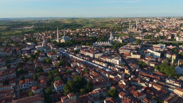 aerial drone historic city landscape of Edirne, Turkey. Panoramic drone overflight capturing the dense urban sprawl and architectural skyline at daylight.