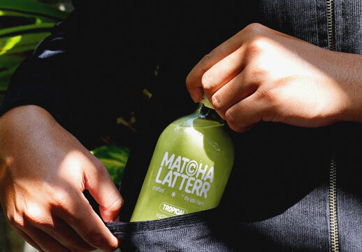 Holding Transparent Matcha Bottle Mockup
