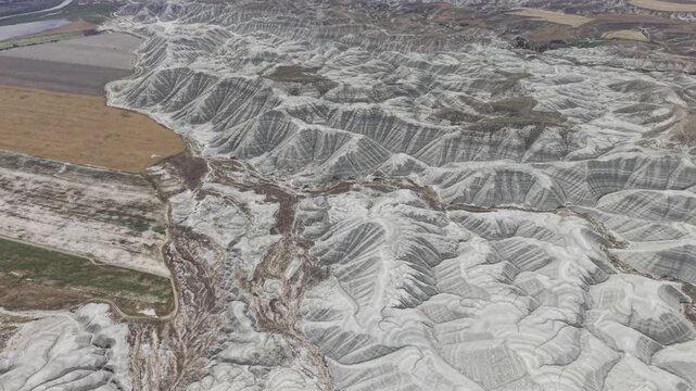 Drone Footage of Nallihan Bird Sanctuary and Rainbow Hills in Ankara Turkey Showing Wetlands and Colorful Geological Landscape