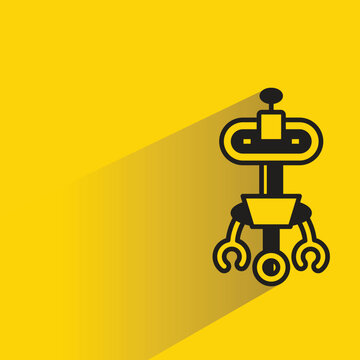 cartoon robot icon with shadow on yellow background