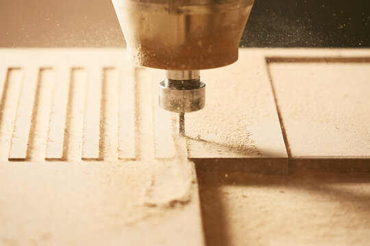 Cutting wood using a machine with numerical control. Cnc tool.