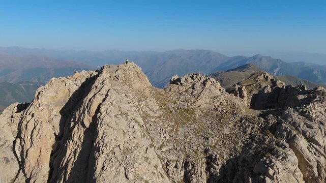 Aerial view Mount Khustup in Syunik province, Armenia. Rocky trails in scenic mountain landscape. Touristic place. Hiking trail. Adventure travel. The height of the mountain is 3,206 meters.
