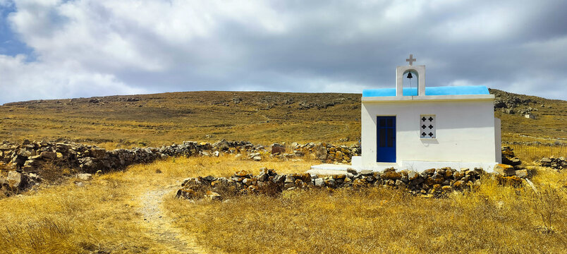 A small orthodox church in a field