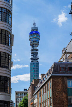 London - 07 14 2022: Capper Street view of BT Tower framed by mixed fa&ccedil;ades