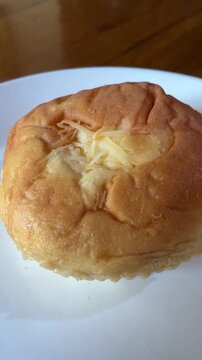 Homemade Cheese Bun Bakery Food Video Spinning on White Plate
