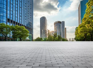 Captivating Urban Landscape at Sunset with Modern Skyscrapers and Lush Greenery © evening_tao