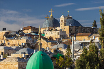 Fototapeta premium Church of the Holy Sepulchre Domes over Jerusalem Old City Rooftops.