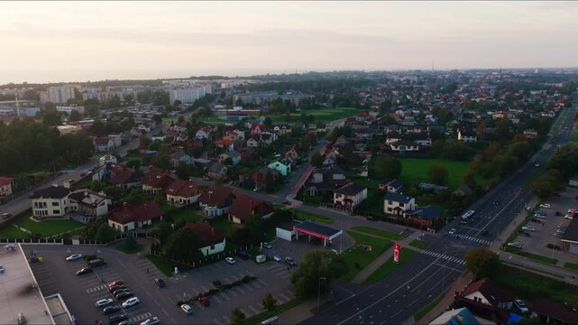 Sunset aerial view reveals Liepaja private homes beside Lake Liepaja