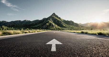 Obraz premium Open Road Leading to Majestic Mountain Peak at Sunrise Symbolizing Journey and Success