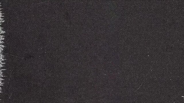 Dark Fabric Texture with Jagged Edge and Subtle Lines